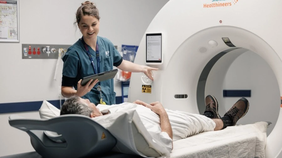 radiology-staff-member-provides-imaging-scan-to-patient.jpg